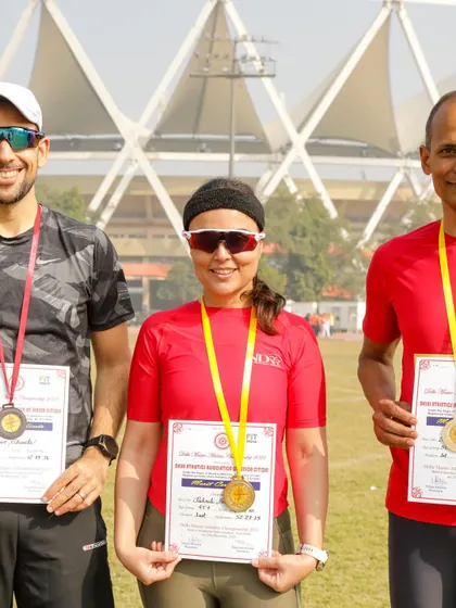 A close-up of our three medalists from the Masters Meet. Their hard work and commitment to challenging themselves paid off.