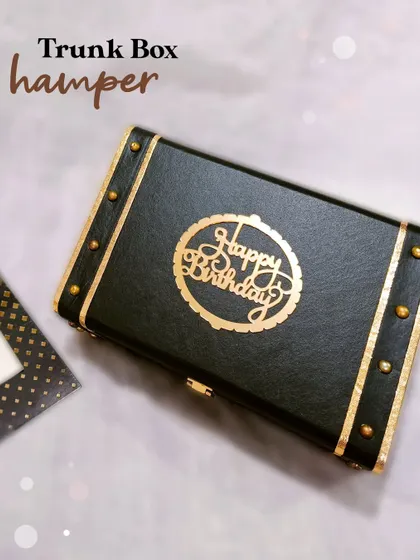 This Trunk Box hamper is ready for a birthday celebration, featuring a beautiful gold "Happy Birthday" cutout on the lid.