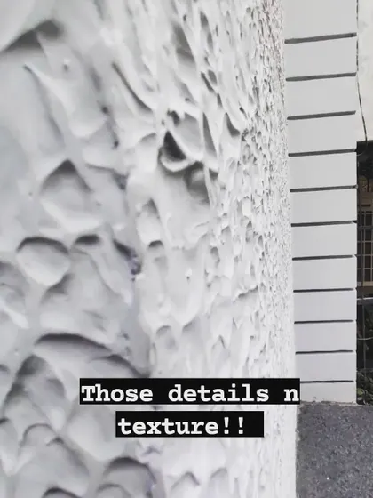 A close-up shot of the beautiful texture and detail on an exterior wall finish. We believe that even small details contribute to the overall quality and aesthetic of a project.