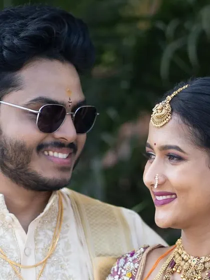 A close-up of the happy couple, with Jagruthi's makeup looking fresh and natural.