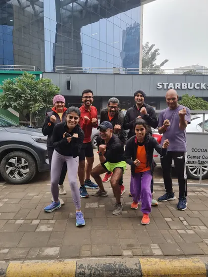 The tribe posing in front of Starbucks. A well-earned treat after a tough winter run.