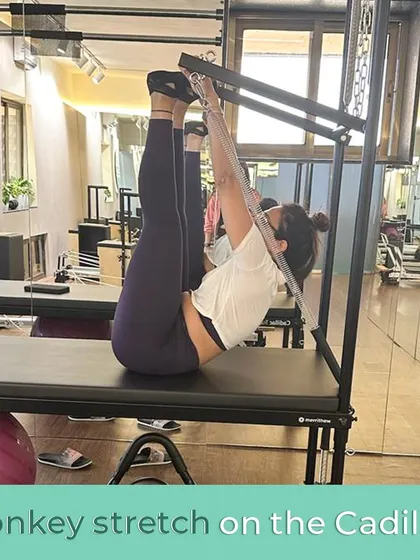 The Monkey Stretch on the Cadillac is a fantastic way to decompress the spine and lengthen the hamstrings. It looks playful, but it's a powerful stretch that requires core control and builds incredible flexibility through the entire back of the body.