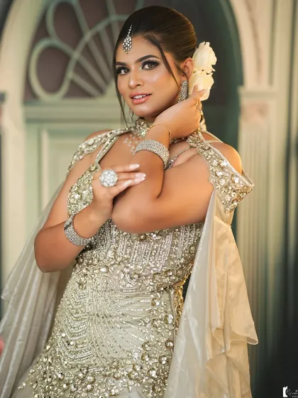 A breathtaking reception gown look. We teach how to apply makeup that complements heavily embellished outfits like this one.