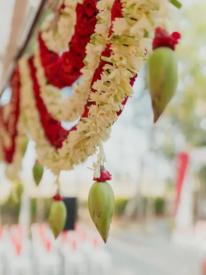 A close-up of the traditional mango and flower garlands, a symbol of auspicious new beginnings.