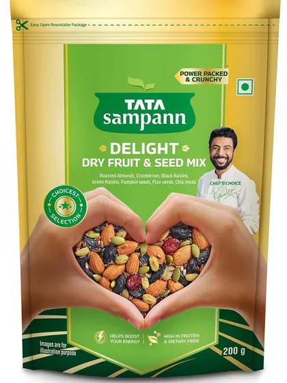 A similar concept for Tata Sampann's Dry Fruit & Seed Mix. The heart-shaped hands full of colorful ingredients instantly communicate that this is a product you can feel good about eating.
