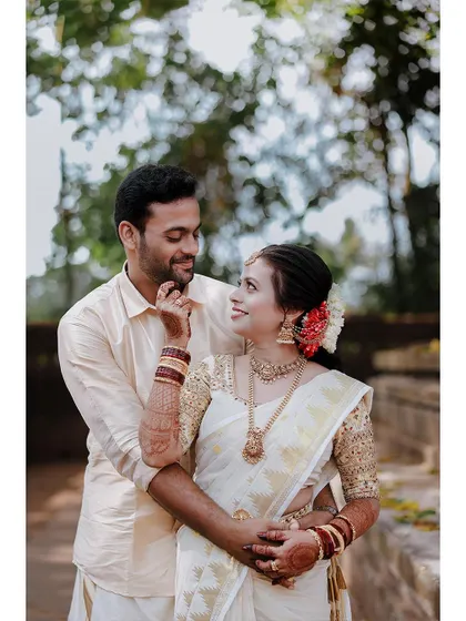 A happy and loving portrait of a couple, their smiles reflecting the joy of their wedding day.