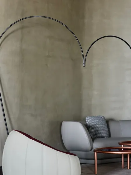 A detail of the heart-shaped, arched floor lamp in the Ventura showroom. We use statement pieces like this to create memorable moments within a larger retail space.