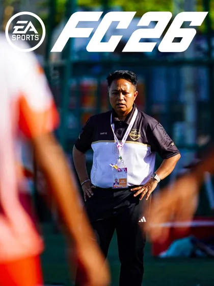 The mastermind on the sidelines. Our coach's intense focus is perfectly captured in this reimagined FC26 cover.