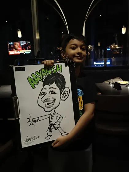 This young martial artist is ready for action in his caricature. I love incorporating kids' hobbies into their portraits.