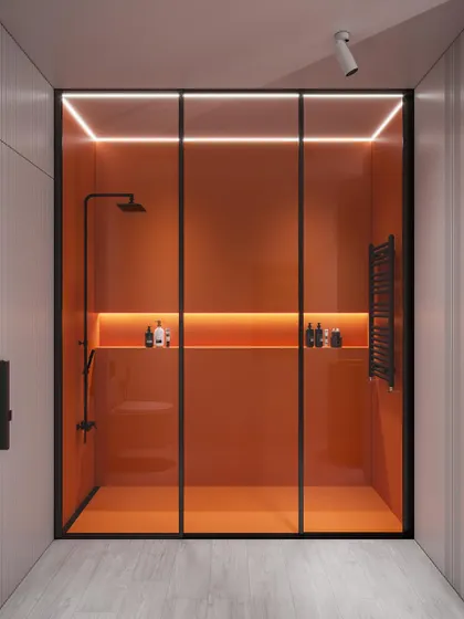 A concept for a shower cubicle with vibrant orange back-painted glass and integrated LED lighting.