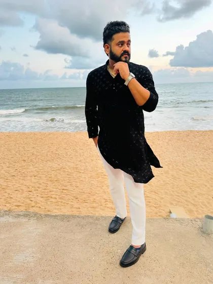 Dressed for a beach wedding in Udupi. I believe in being part of the celebration, not just playing music for it.