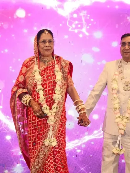 Celebrating a lifetime of love. This is from a 50th wedding anniversary, where the couple renewed their vows against a beautiful, heart-themed backdrop, showing that love stories are timeless.