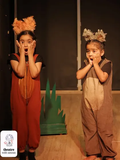 The two wolves from our reimagined "Three Little Pigs" story, looking shocked at what they've discovered.