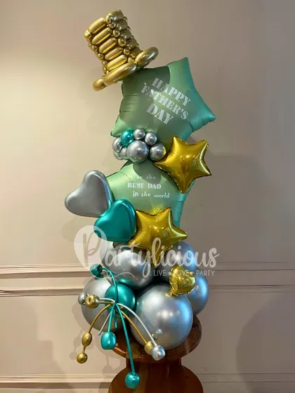 This stylish Father's Day balloon stack features a cool color palette and star accents. The "Best Dad in the World" message adds a personal touch to this modern and celebratory gift.
