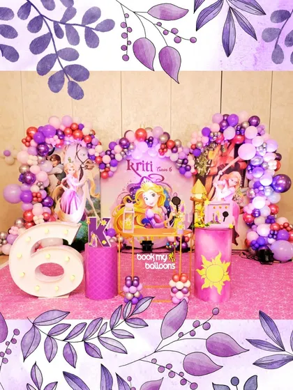 We let down our hair for Kriti's sixth birthday with this magical Rapunzel theme. The decor was a sea of purple and pink, with character cutouts, a light up number '6', and Tangled's signature sun symbol.