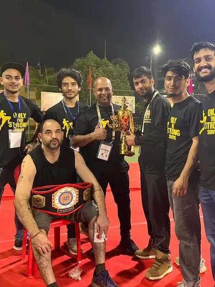 Another shot of the team celebrating their victories at the national championship. This is the culmination of our "Only The Strong Survive" philosophy.