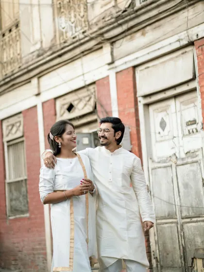 A lovely walking shot against a rustic red brick building. The textures of the location add a lot of visual interest.