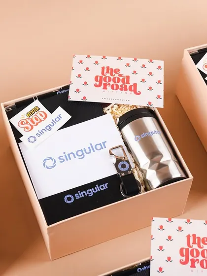 A batch of new joinee hampers for our repeat client, Singular. Each box includes a branded tumbler, notebook, and other goodies, all presented with our signature "The Good Road" card.