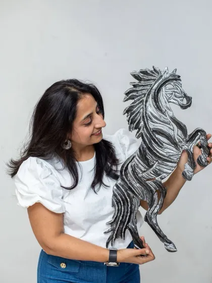 Admiring "The Rising Horse." Its dynamic, rearing pose captures a moment of pure power and ambition.