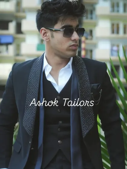 A model wearing a black three-piece suit with a textured lapel. The outdoor shot shows how good it looks in natural light.