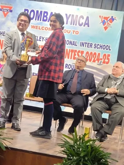 A proud moment as Lakshita receives her trophy on stage. We believe in nurturing well-rounded individuals who excel in all their passions.