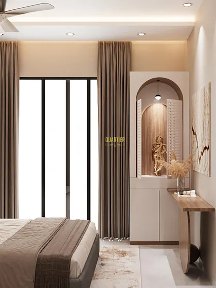 A detail shot of the mandir and console ledge in the parents' bedroom at ATS Rhapsody. The semi-closed jaali doors on the mandir add a traditional touch to the modern European design.