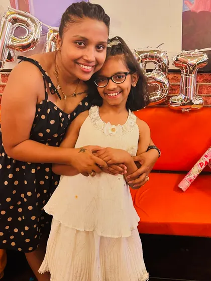 A cherished memory with my niece at her birthday party. Family moments like these are what make life so perfect.
