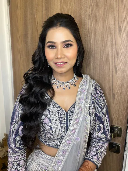 Another angle of this stunning engagement look, showing the flawless blend of the eyeshadow and the radiant skin finish.