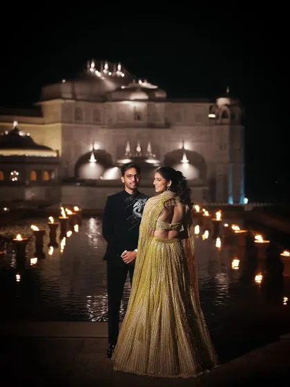 A beautiful portrait of the couple by the candlelit water feature. The location was used to its full potential to create stunning photo opportunities.