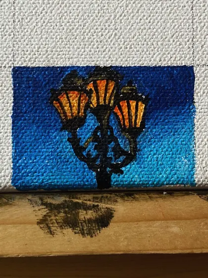 A mini-painting of a vintage-style street lamp.