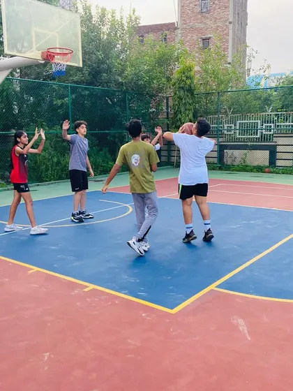 A player practices a jump shot, focusing on balance and release point.