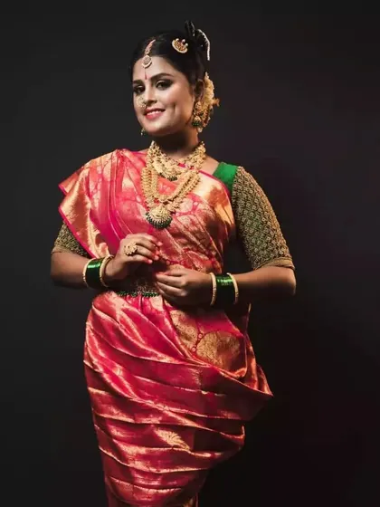 This unique draping style, paired with our rental saree and blouse, is perfect for a themed wedding or event.