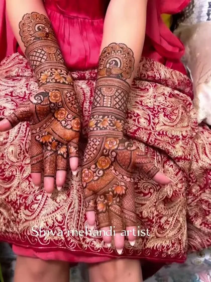 A gorgeous floral mehendi with a focus on rose motifs. The use of shading gives the flowers a three-dimensional appearance.