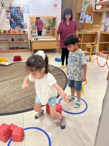 An obstacle course is an invitation to problem-solve with the body. Here, children develop gross motor skills, balance, and coordination while navigating challenges in a fun, supportive group setting.