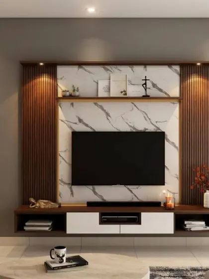 This TV unit combines a white marble back panel with dark wood slats for a high-contrast, luxurious feel. The floating console and open shelves provide a perfect balance of storage and display.