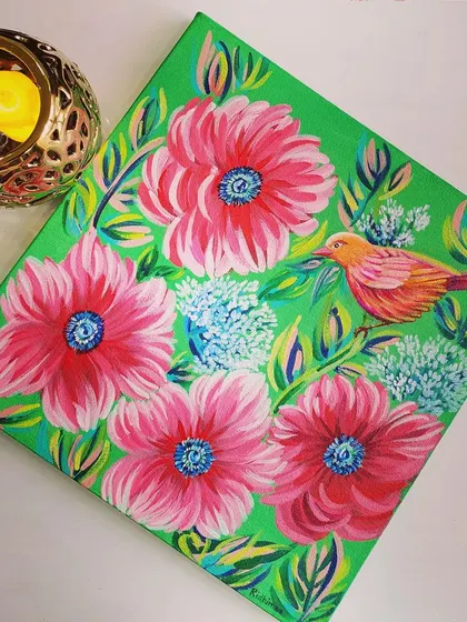 A finished acrylic painting on canvas, featuring a colorful bird amidst vibrant pink flowers. This piece showcases the lively and detailed style I teach in my canvas painting classes for adults and teens.