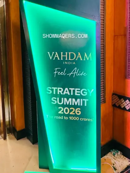 Branded signage is key for reinforcing the event's identity. This custom-fabricated, backlit sign clearly displayed the Vahdam Strategy Summit's theme and branding, serving as both a directional marker and a photo opportunity.