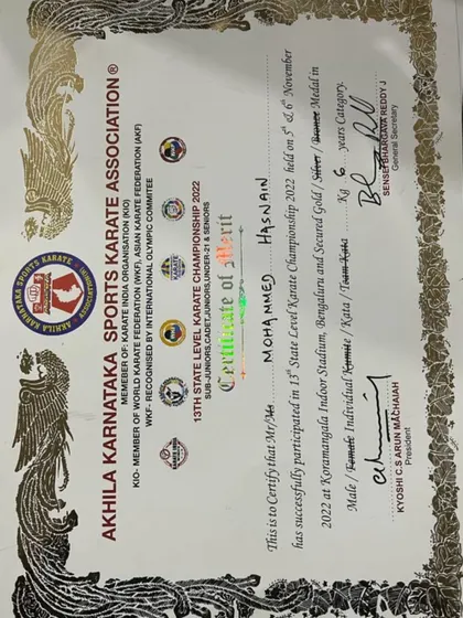 The official certificate from the Akhila Karnataka Sports Karate Association for my son Hasnain's gold medal win at the 13th State Level Championship.
