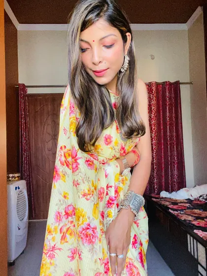 A saree is a beautiful style for everyone. Here I am in a yellow floral print saree, paired with oxidized silver bangles for a simple, fresh, and summery ethnic look.