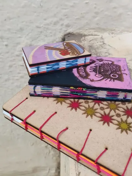 Our laser cut bookbinding workshop lets you create a beautiful handmade book with custom engraved wooden covers.