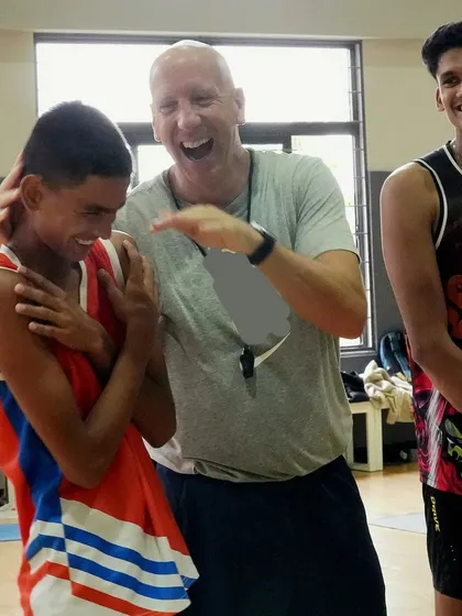 It's not just about hard work, it's also about having fun. A lighthearted moment between Coach Phil and our young players.