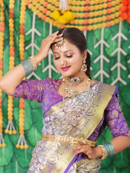 This bride chose a Victorian-style choker and haram set for her reception. The intricate design and subtle sparkle are perfect for an elegant evening look.