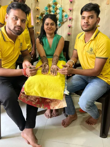 My team with a client, ensuring she is happy with her design.
