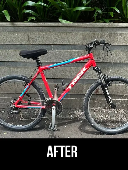 The full 'after' shot of the red Trek. It looks stunning after a complete wash, polish, and tune up. We test ride every bike to ensure it meets our standards.