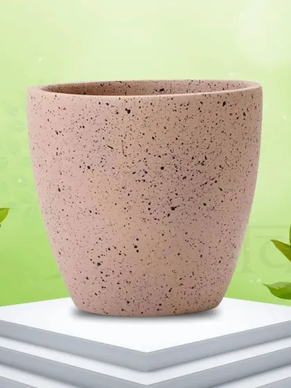 This Marble Terrazzo Terracotta Pot has a unique rose gold matte finish with a speckled pattern. It adds a touch of luxury and is perfect for a modern decor style.
