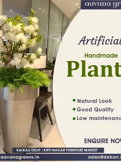 Our artificial handmade plants offer a natural look, good quality, and low maintenance. This large flowering plant in a metallic pot is a beautiful statement piece for any room.