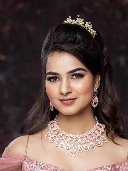 This rose gold AD stone necklace is a perfect example of modern party wear jewellery. It is elegant, lightweight, and adds the right amount of sparkle to a gown.