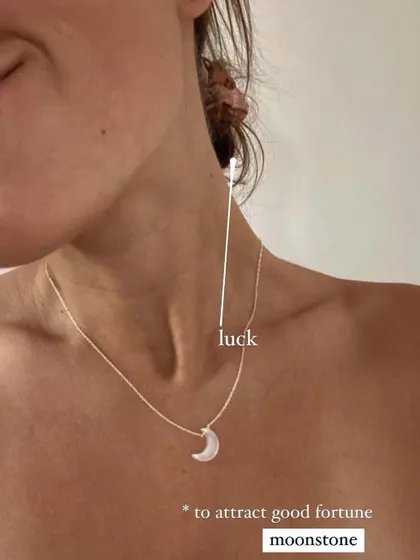 Another lifestyle shot of the White Moonstone Luna pendant, a perfect piece for luck.