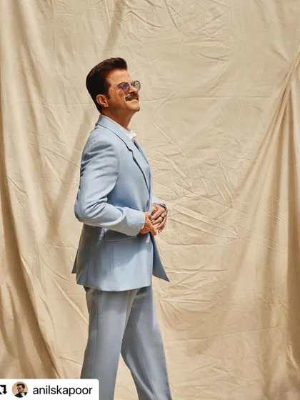 Another shot of Anil Kapoor at TIFF, showing his hair looking great from the side.