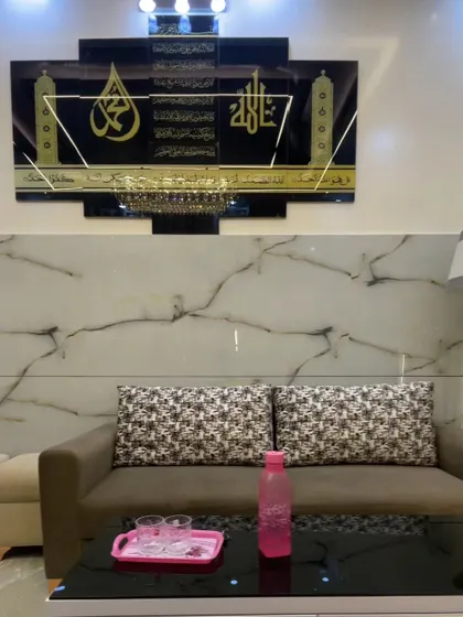 Another view of the living space, showing the arrangement of the sofa and coffee table. The design ensures the room is comfortable for both daily use and for hosting guests.